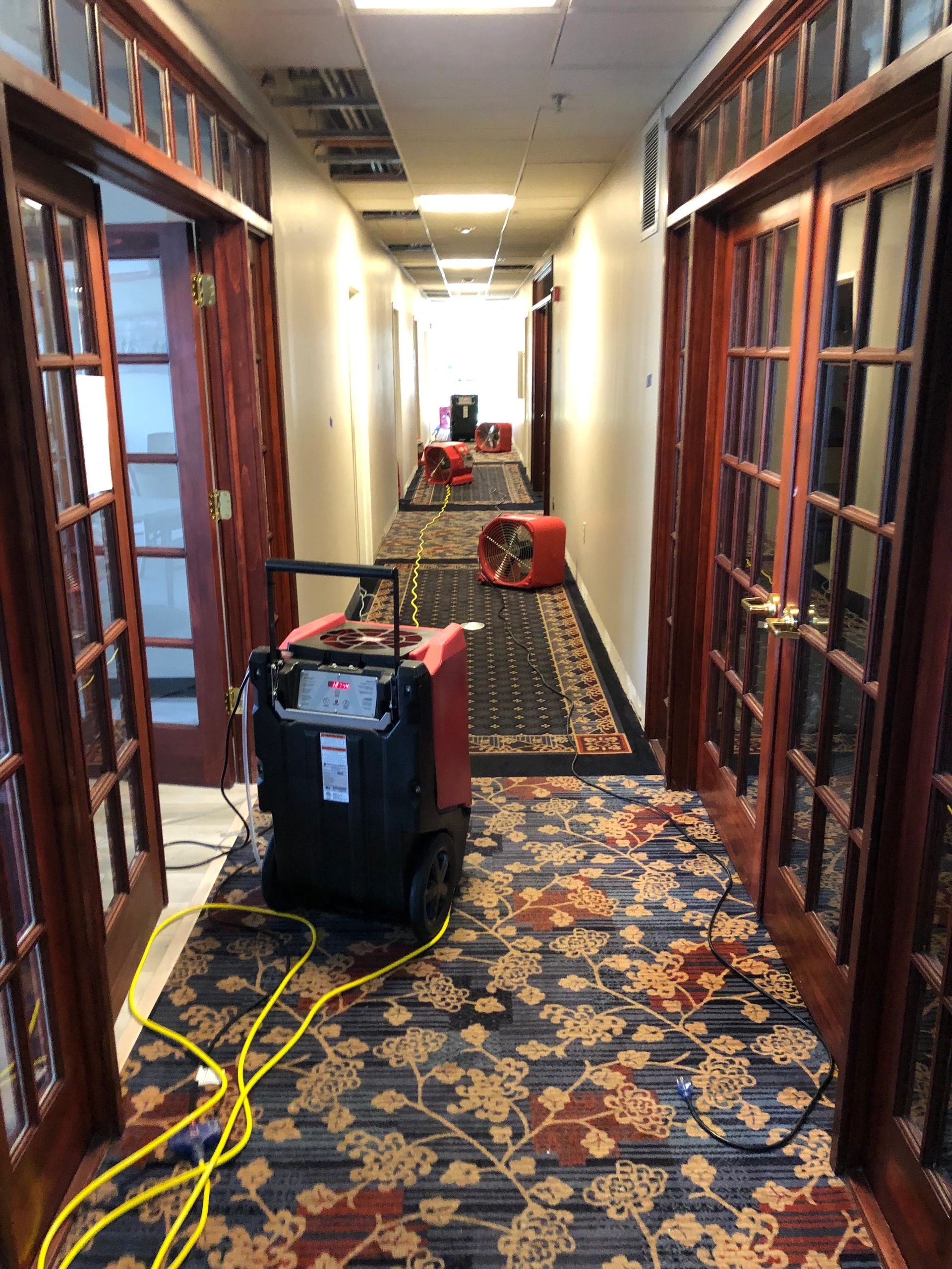 Commercial hallway restoration with drying equipment